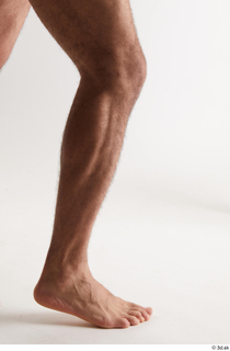 Simeon  1 calf flexing nude side view 0002.jpg